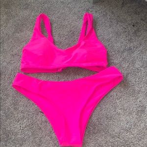 Neon pink swim suit